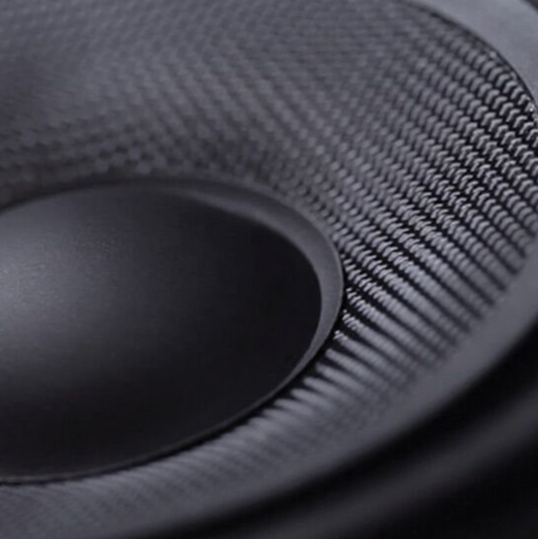 closeup of a Bavsound speaker showing the kevlar knitted weave detail 